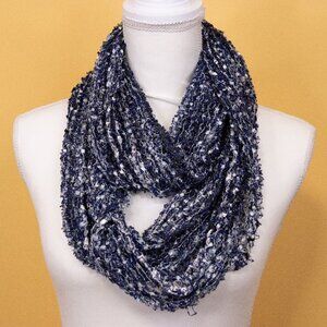 Gauzy blue scarf with white and silver thread accents